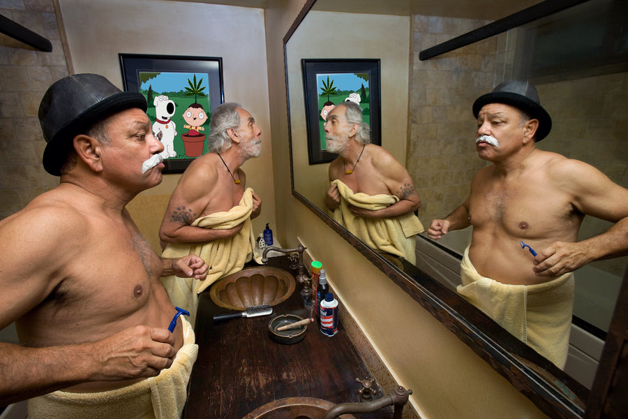 Cheech Marin and Tommy Chong shaving at a bathroom mirror in towels, their reflections doubling them, photographed for High Times