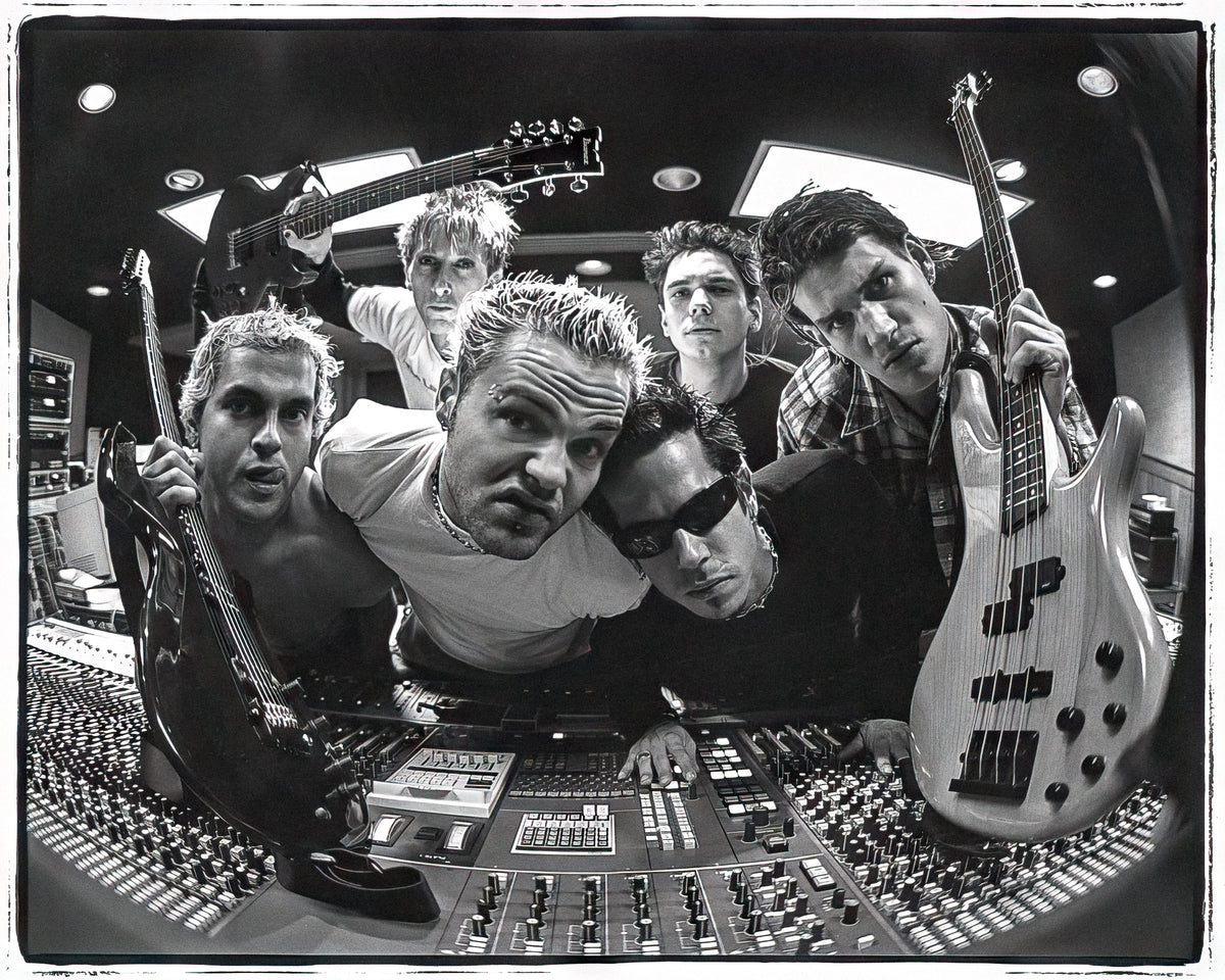 Crazy Town crowded into the frame in black and white with guitars, Westlake Recording Studios