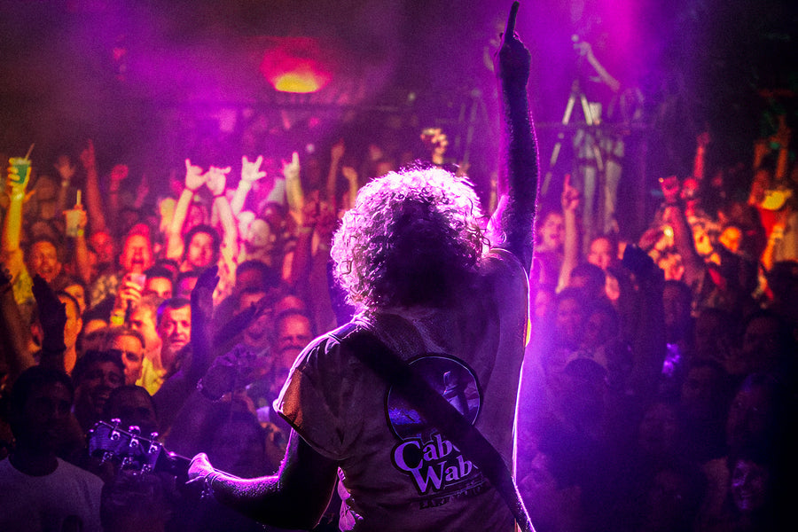 Sammy Hagar playing to a packed crowd under magenta light, Cabo Wabo Cantina, Cabo San Lucas